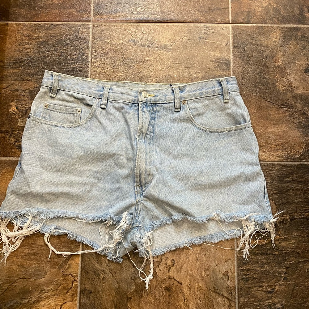 Light wash distressed denim shorts by Route 66